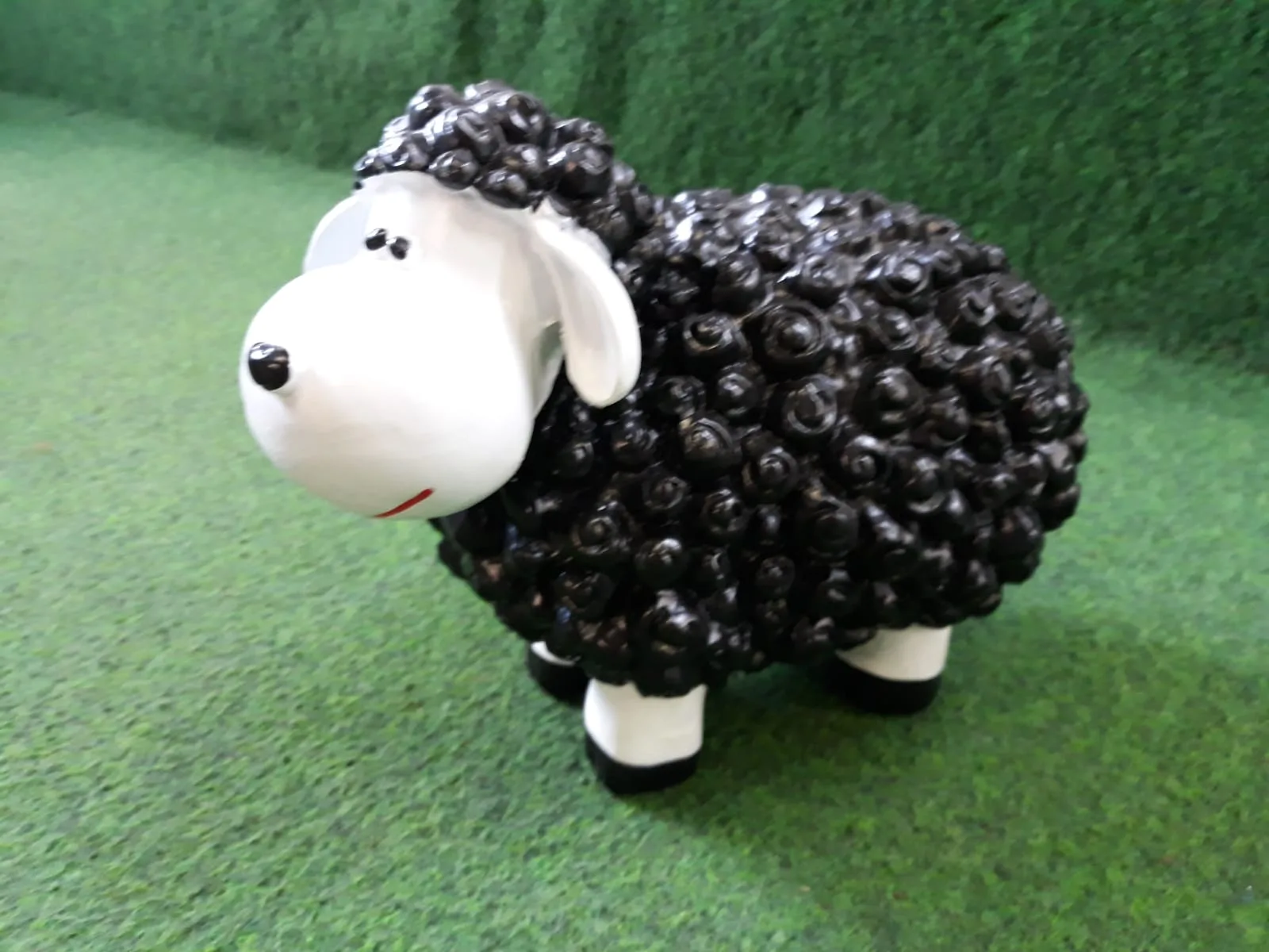 Mini lam met wol Zwart